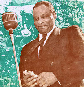 Robeson at microphone during 1952 concert at the Peace Arch in Vancouver, Canada.